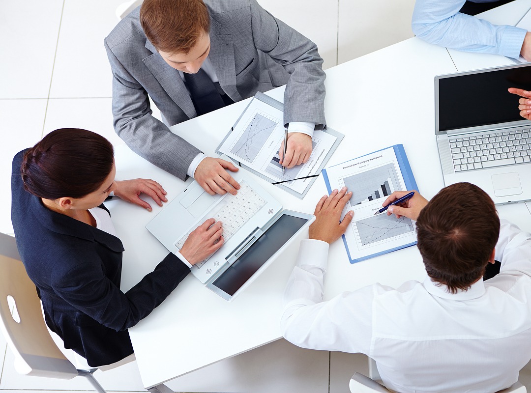 top-view-co-workers-planning-strategy